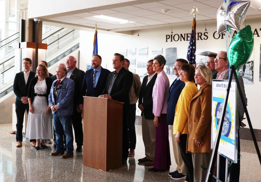 SB76Signing2 ✈️ Rapid City Regional Airport Local officials gather for Senate Bill 76 loan signing